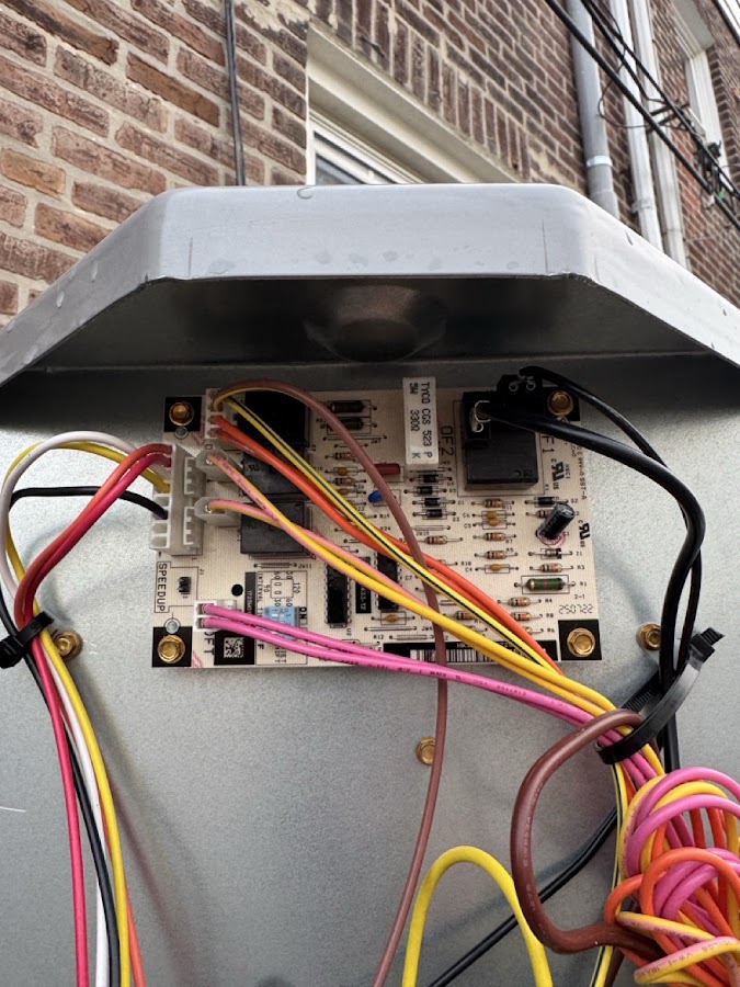 Furnace control board with colored wiring connected